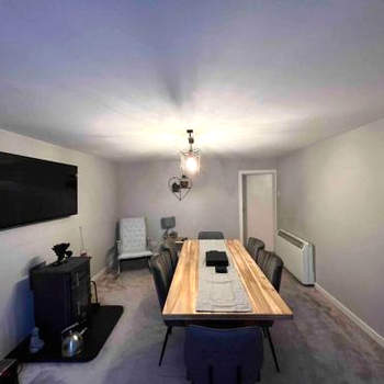 Cheerful 3- bedroom house with indoor fireplace.