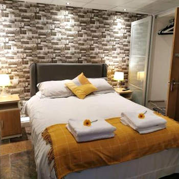 Private garden apartment with secure parking