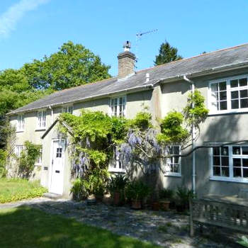 River Cottage a country retreat in wooded gardens