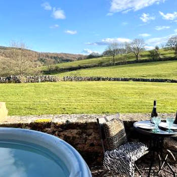 Romantic four poster Cottage private outdoor Hot Tub & Sauna at Harthill Hall plus private daily use of indoor pool and sauna 1 hour per day