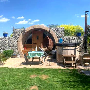 Winter escape luxury hobbit house with hot tub