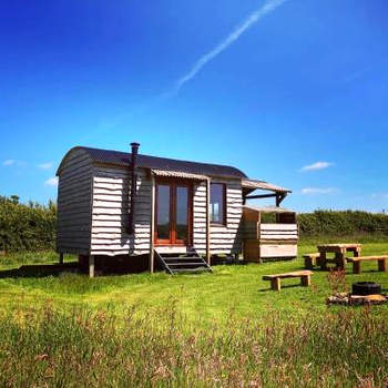 Shepherds Hut in a private meadow with sea views