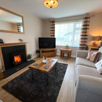 Two bedroom house with enclosed gardens and 2 car drive